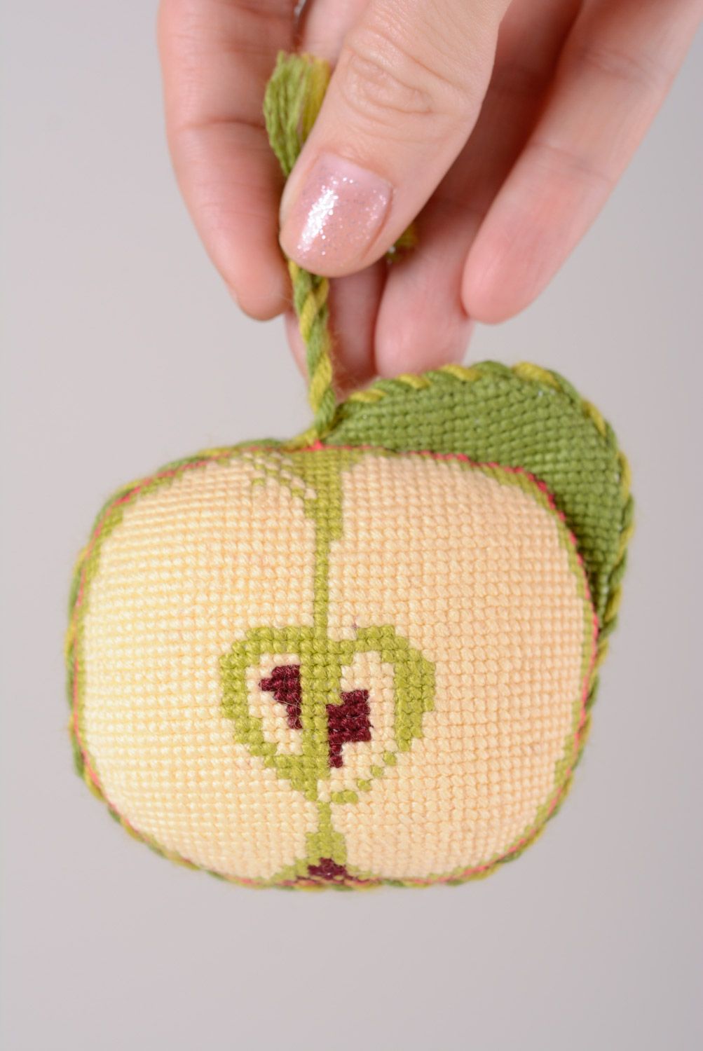 Handmade soft pincushion in the shape of apple with cross stitch embroidery photo 2