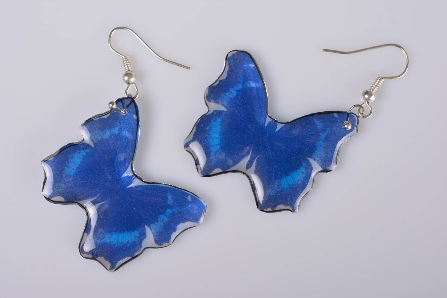 Unusual handmade blue butterfly shaped earrings coated with epoxy resin photo 4