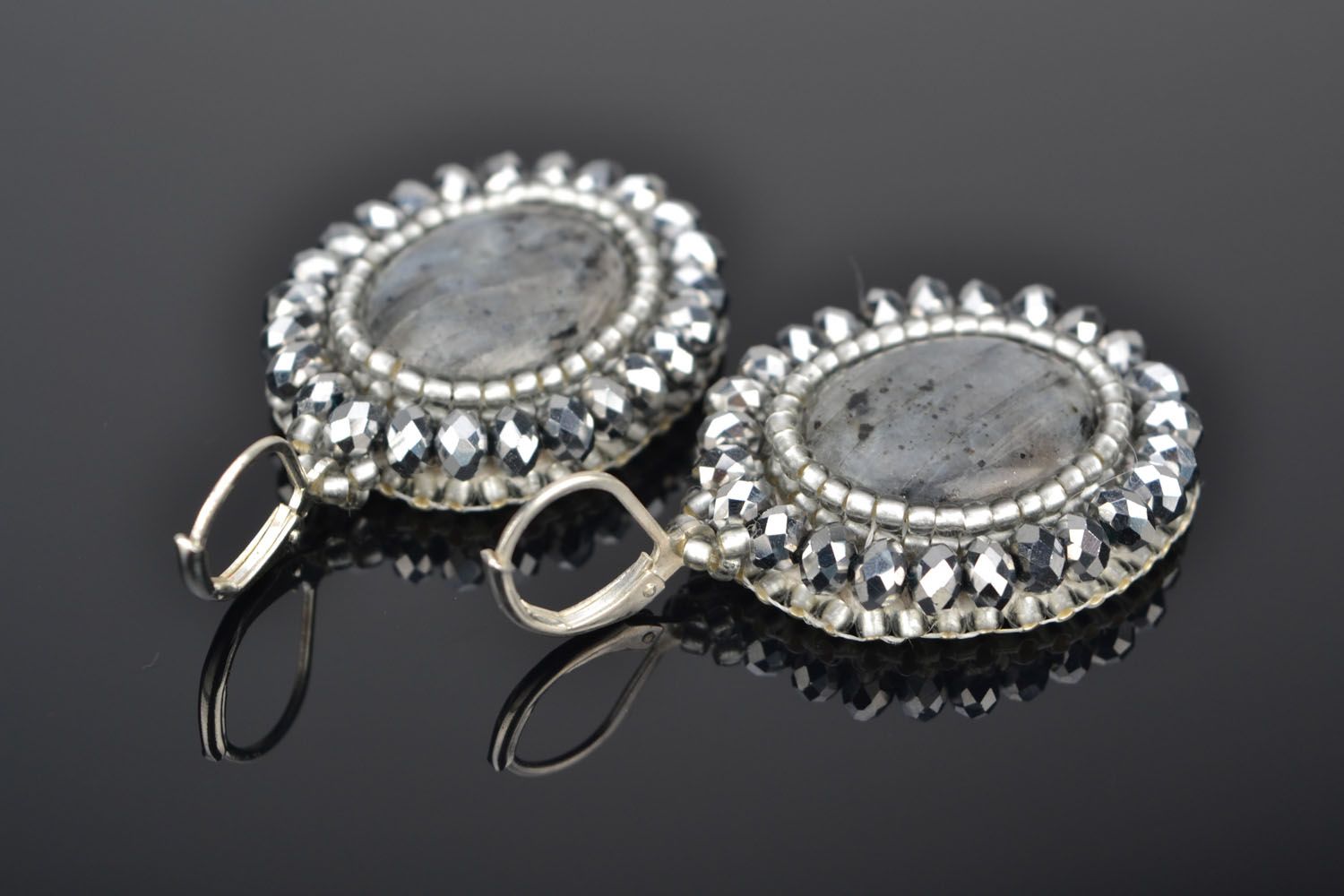 Round earrings with natural stone photo 1