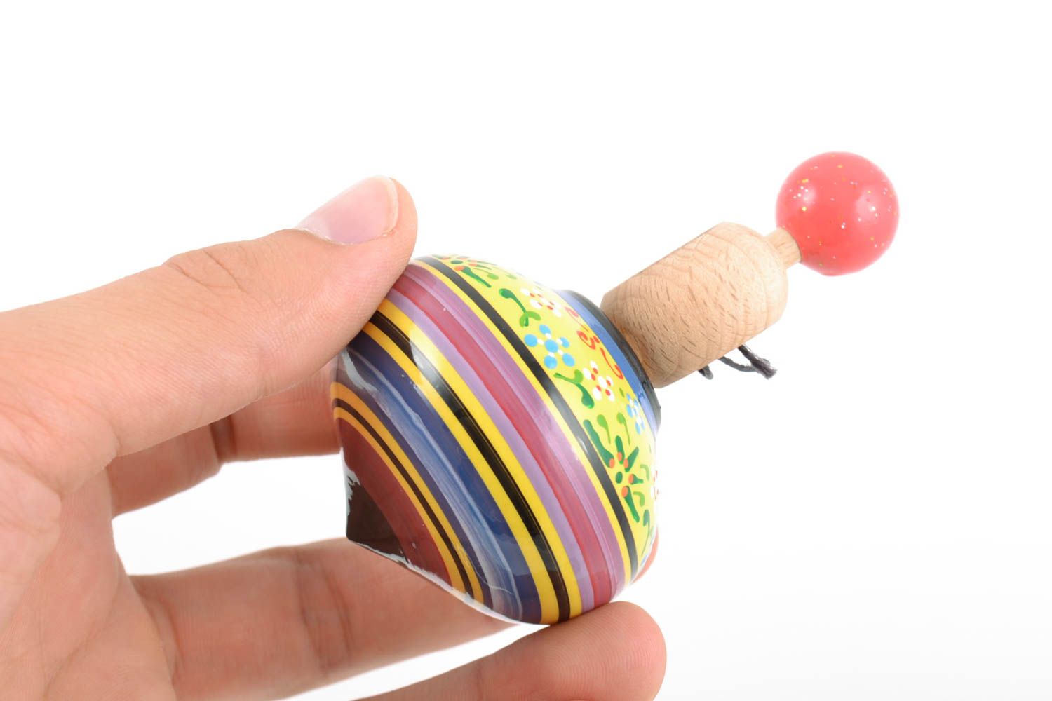 Colorful small handmade wooden spinning top with ring for dexterity development photo 2