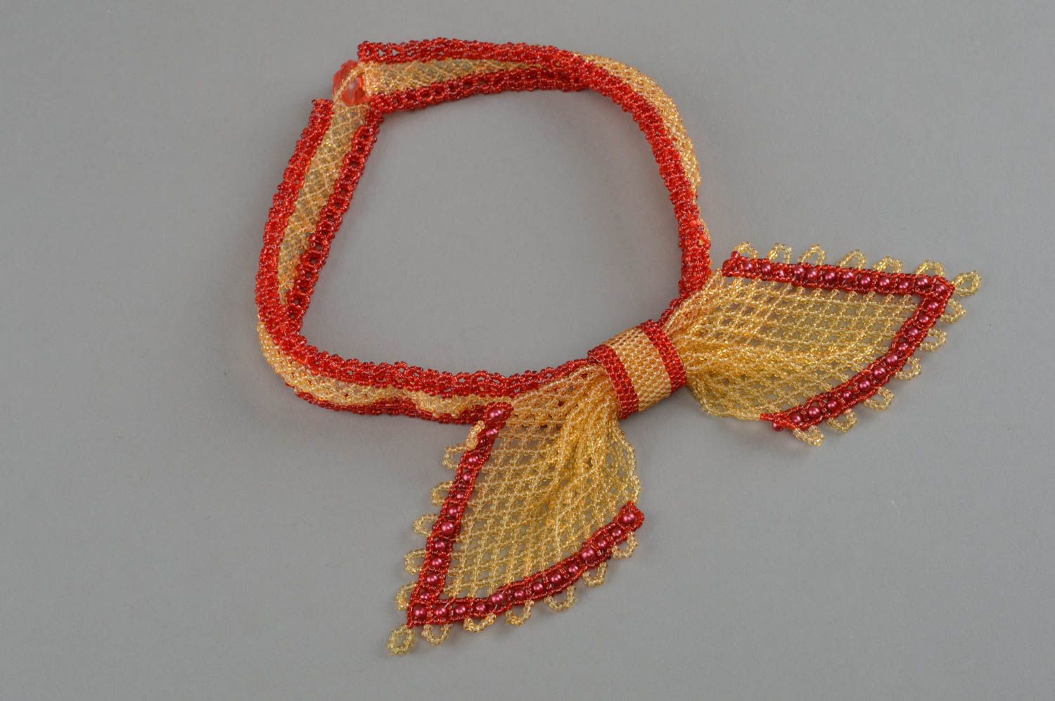 Collier en perles de rocaille noeud papillon jaune rouge fait main pour femme photo 2