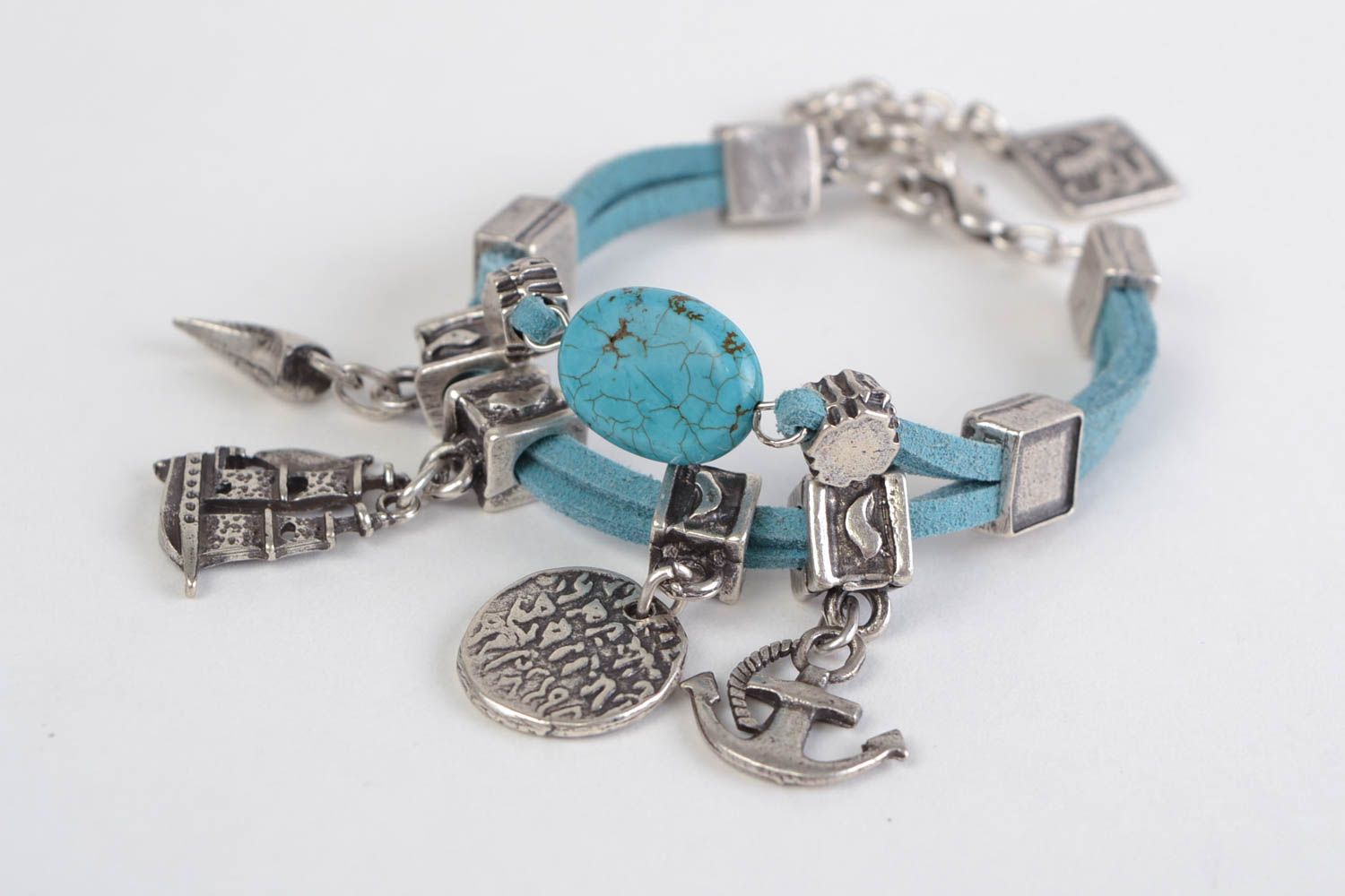 Handmade leather cord wrist bracelet with metal charms and turquoise for women photo 2