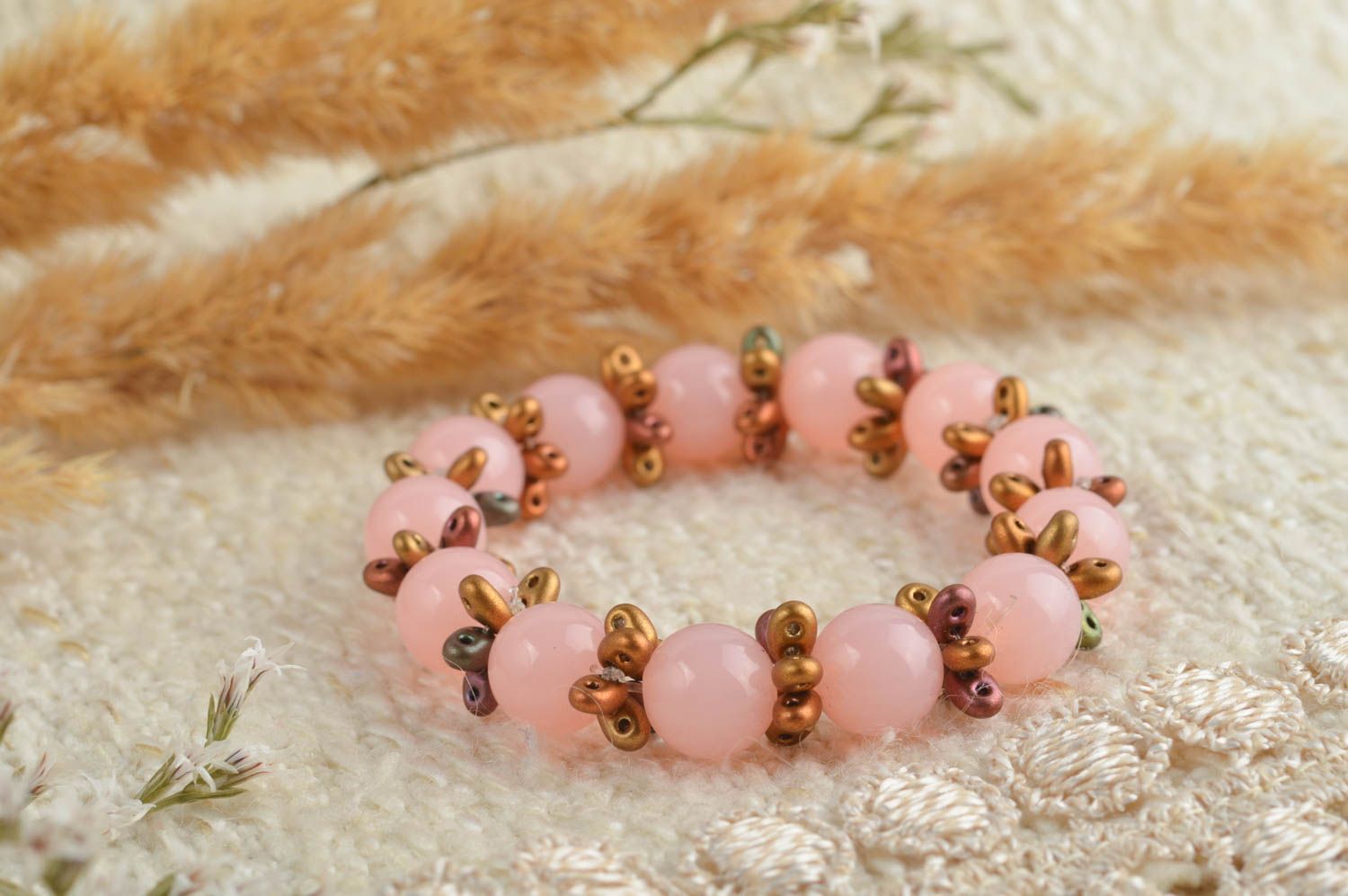 Pink beaded stretch bracelets with flower fittings girls photo 1