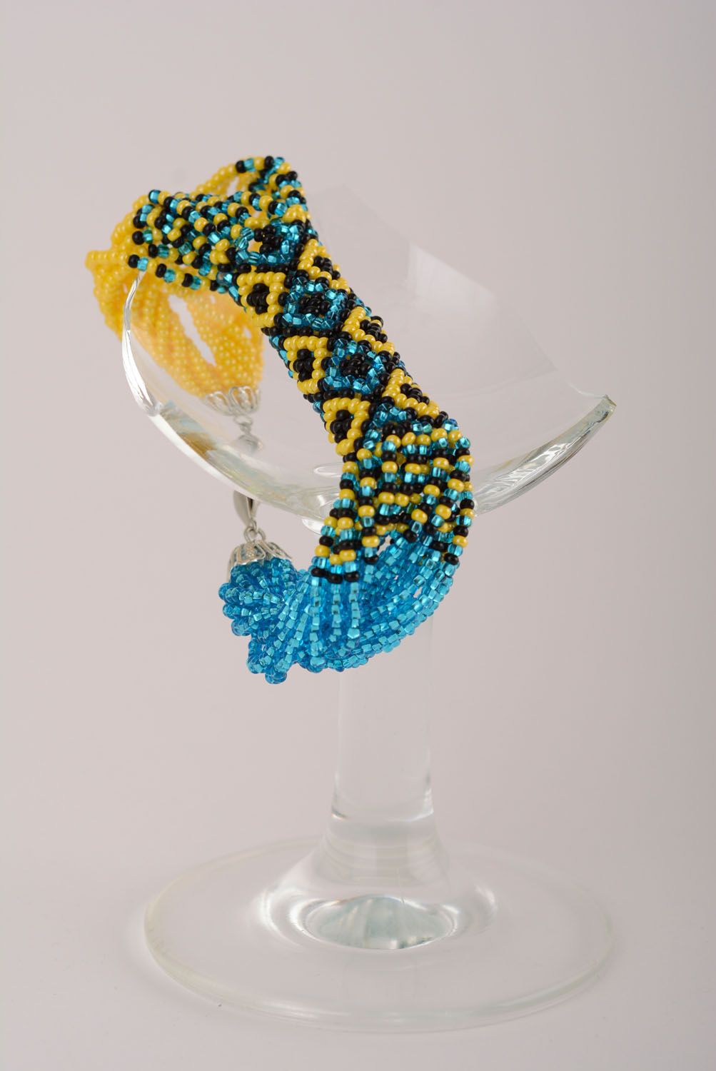 Bracelet en perles de rocaille ethnique bleu jaune noir photo 1