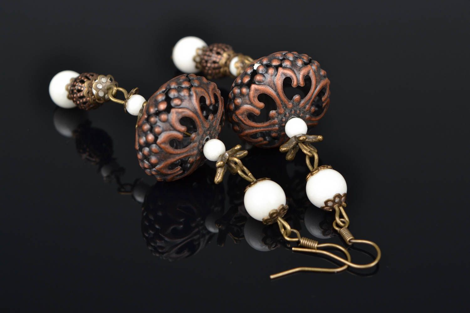 Metal earrings with ceramic beads photo 1