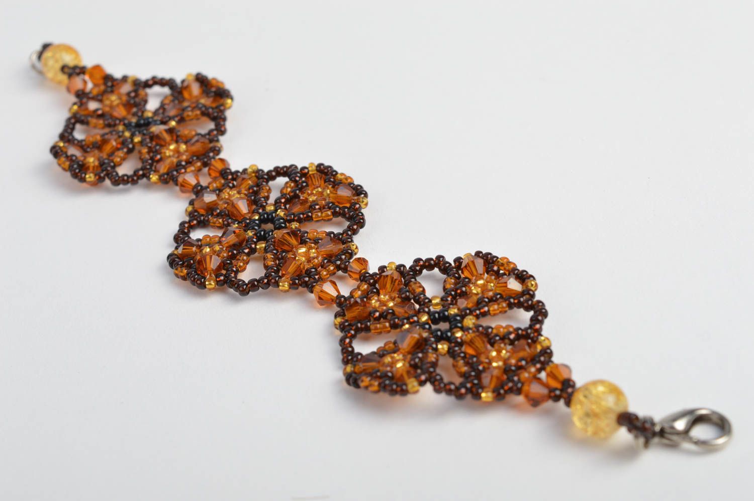 Авторский плетеный браслет из бисера и бусин ручной работы коричневый с желтым  фото 3