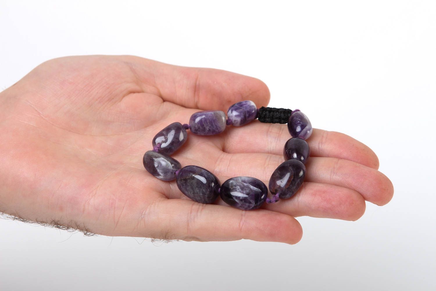 Strand bead gemstone bracelet with black cord and dark blue stone beads photo 5