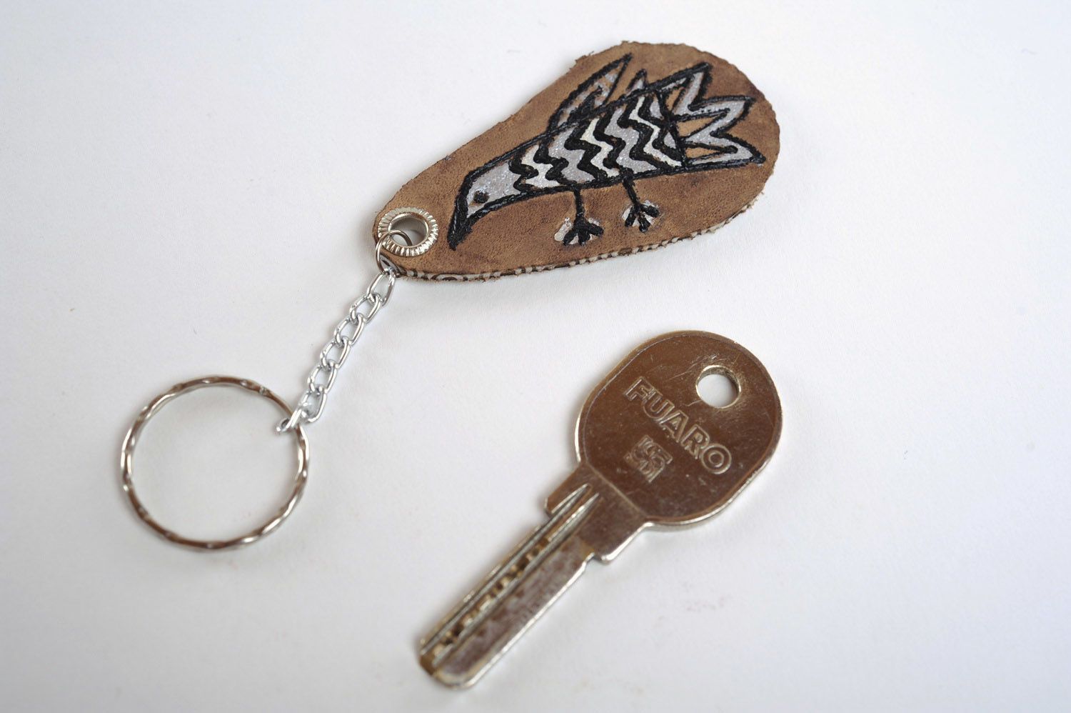 Schlüsselanhänger aus Leder Vogel foto 5