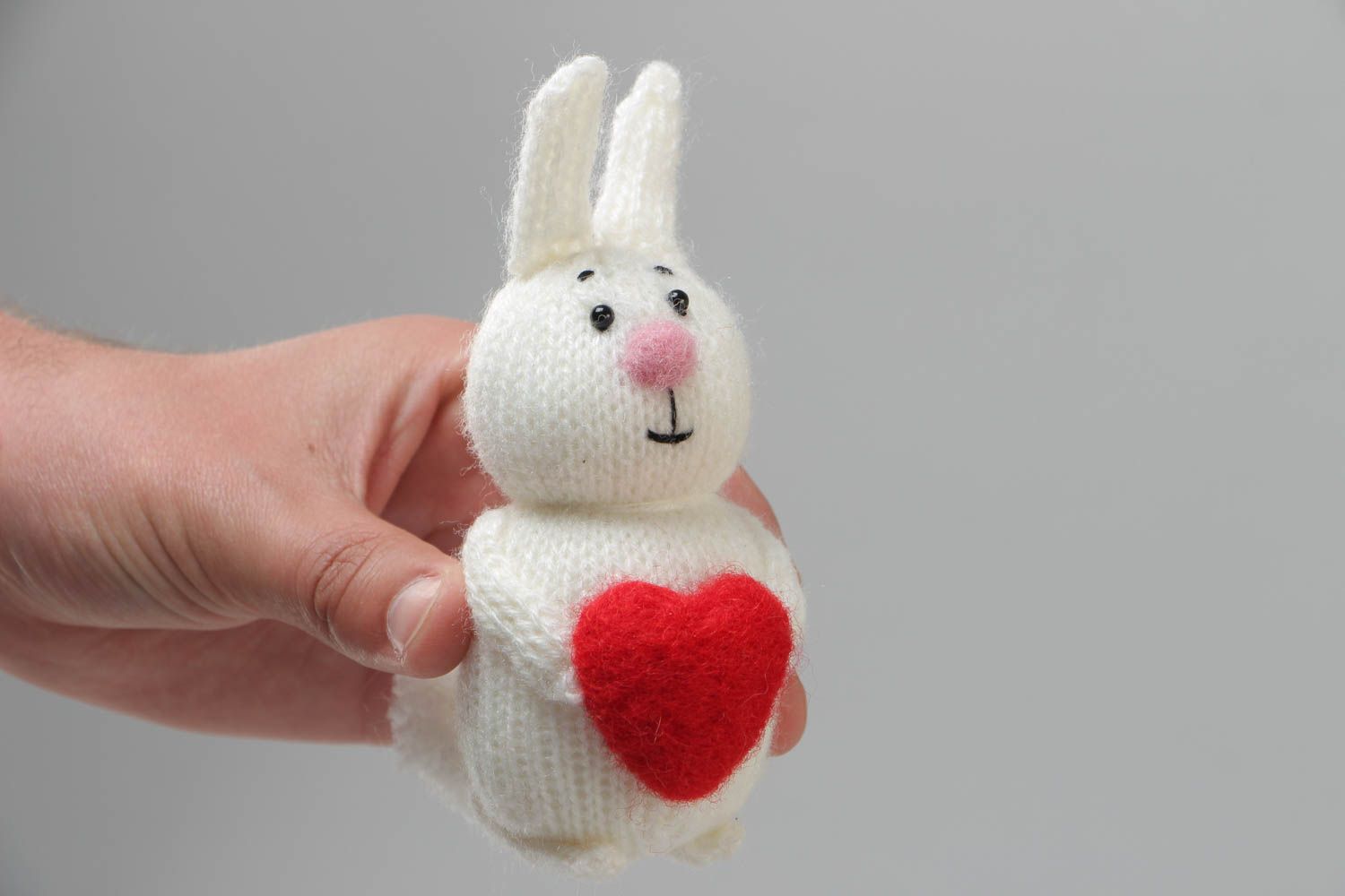 Handmade small soft toy knitted of acrylic threads white rabbit with red heart photo 5