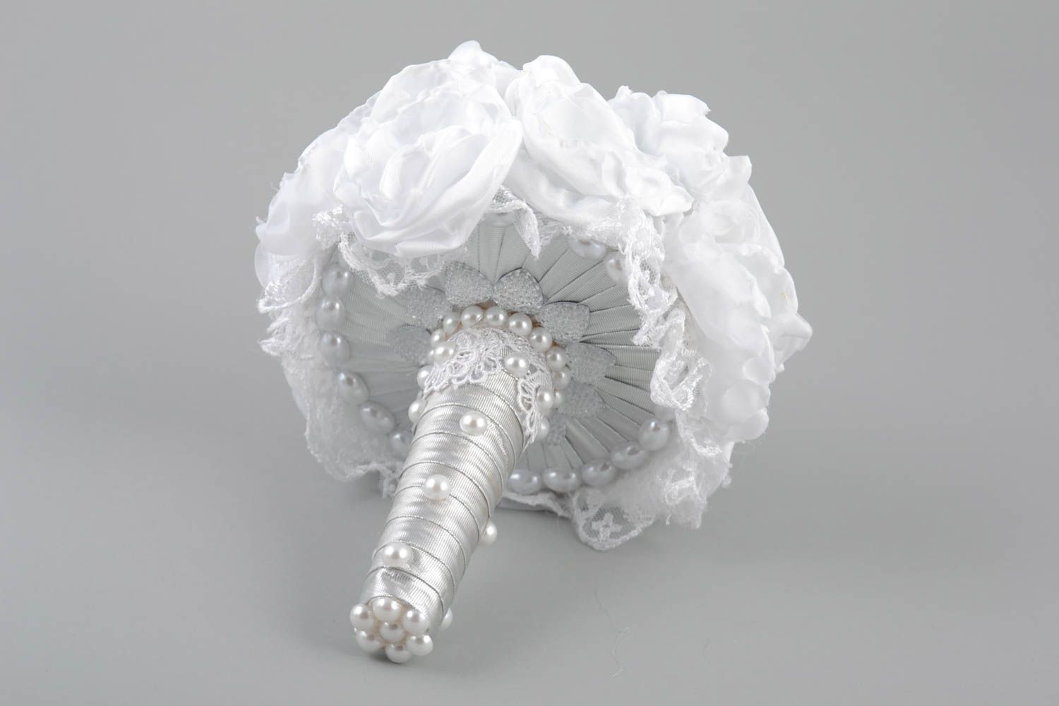 Designer beautiful white wedding bouquet made of satin ribbons and fabric photo 2