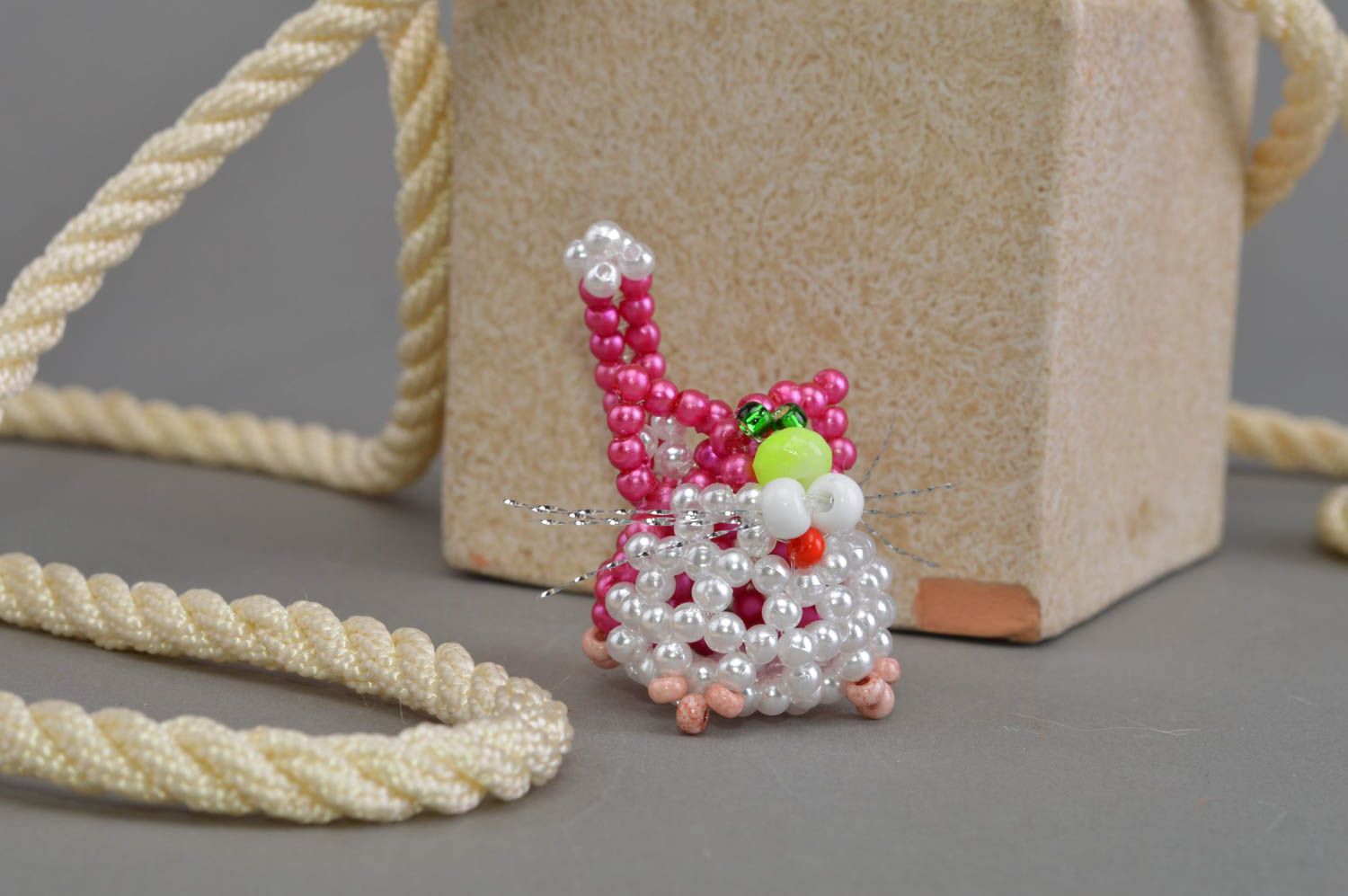 Small handmade decorative beaded statuette of cat of crimson color for gift photo 1