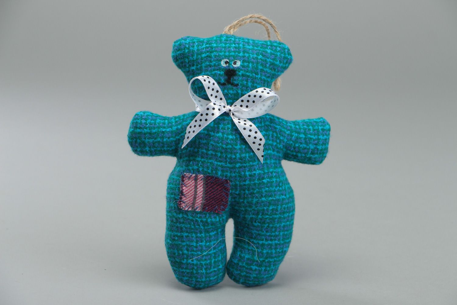 Cute handmade soft toy bear sewn of fabric of turquoise color with eyelet photo 1