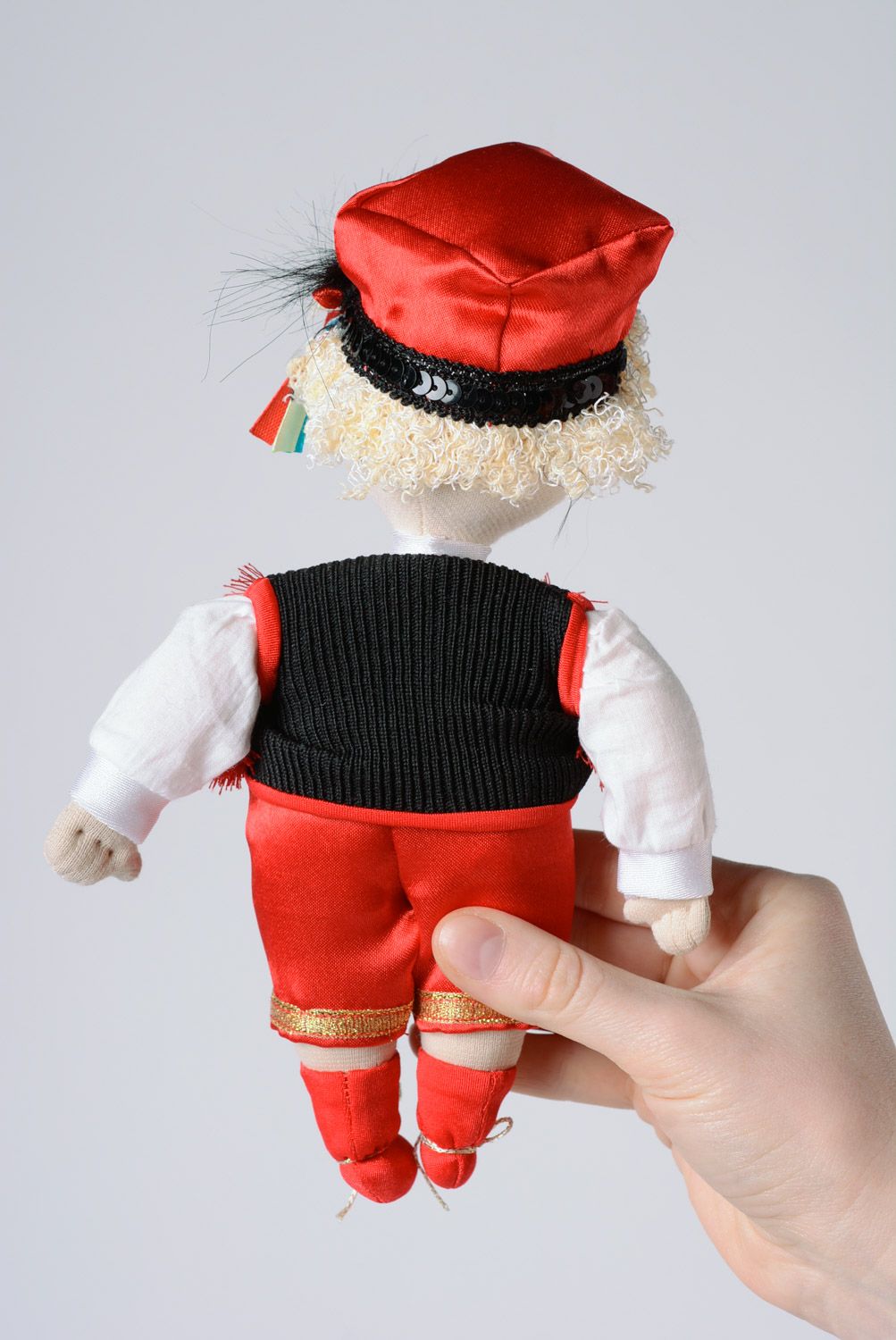 Handmade small soft toy sewn of fabric Polish boy in traditional costume  photo 3
