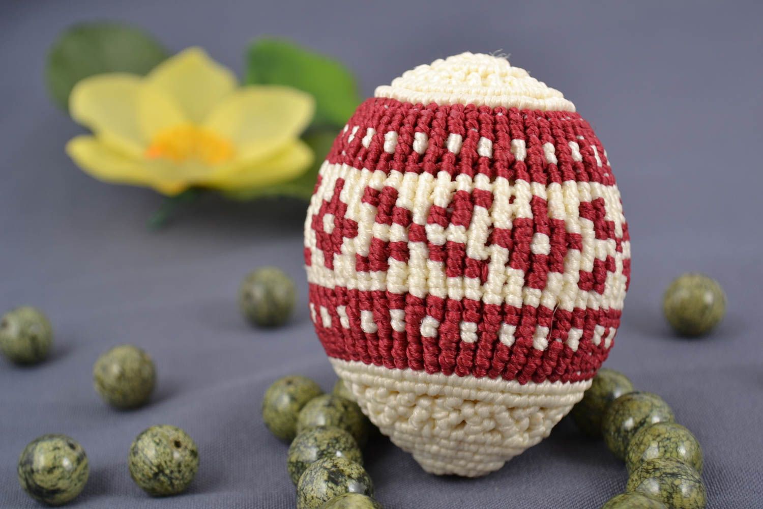 Designer decorative macrame woven Easter egg with ornament and wooden basis photo 1