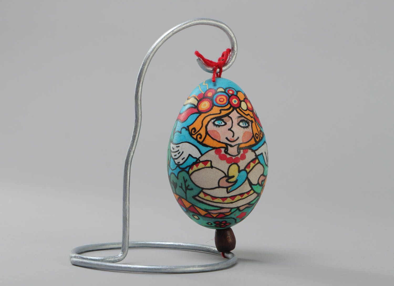 Расписное пасхальное яйцо ручной работы гусиное на металлической подставке  фото 2