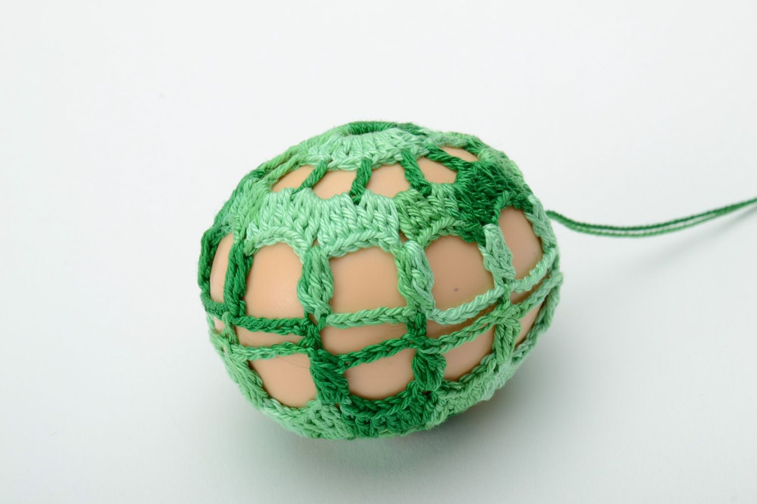 Decorative handmade Easter egg in lacy cover photo 2