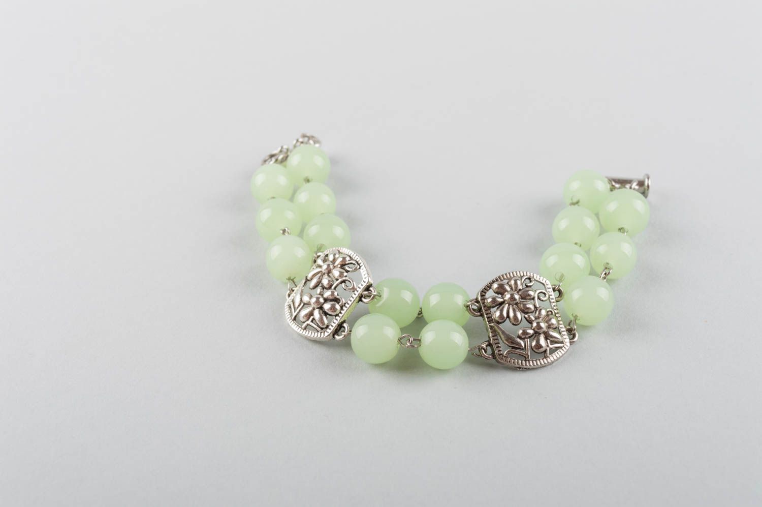Beautiful gentle green handmade metal bracelet with natural nephrite stones photo 4