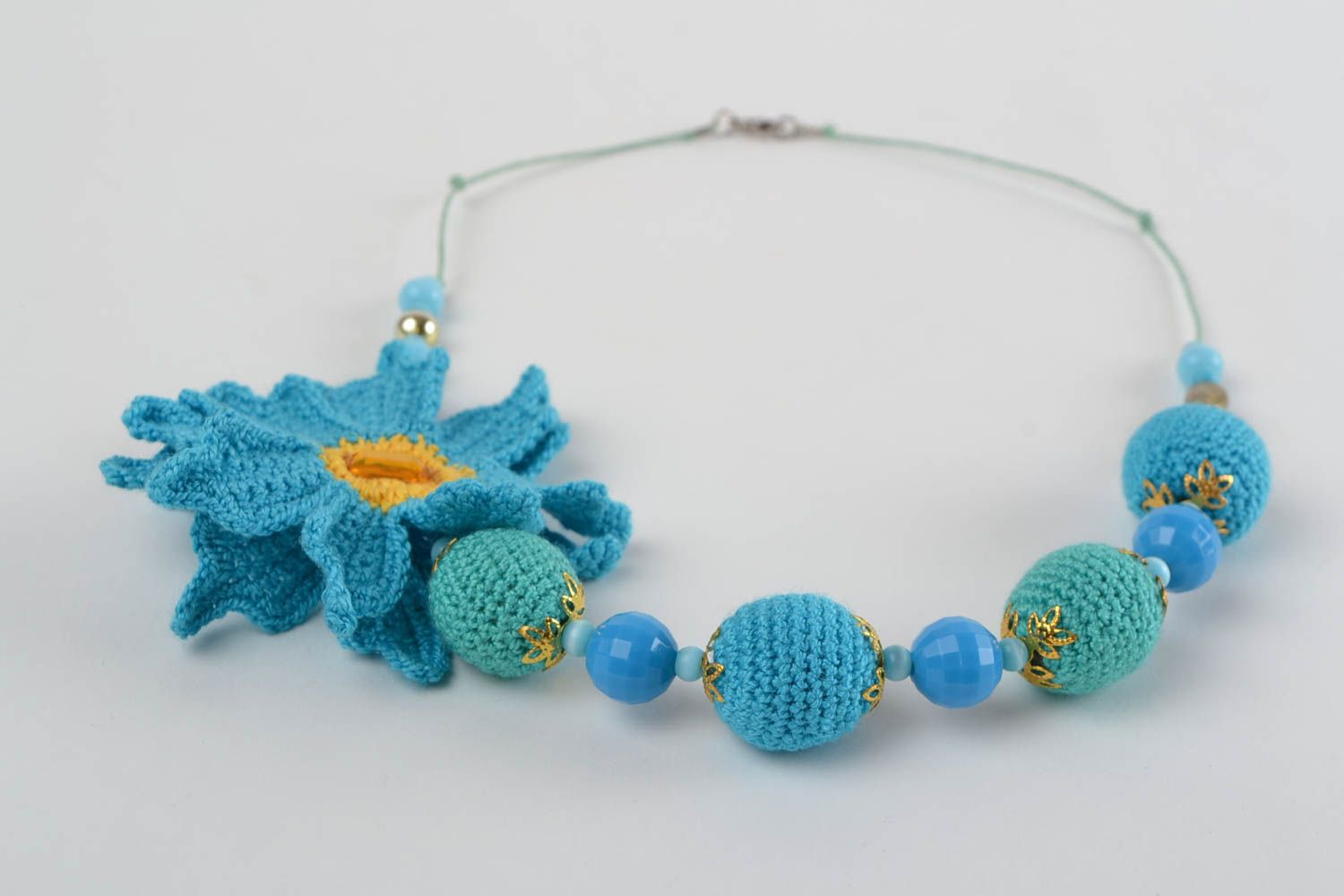 Handmade blue crochet ball necklace with beads and flower babywearing necklace photo 2
