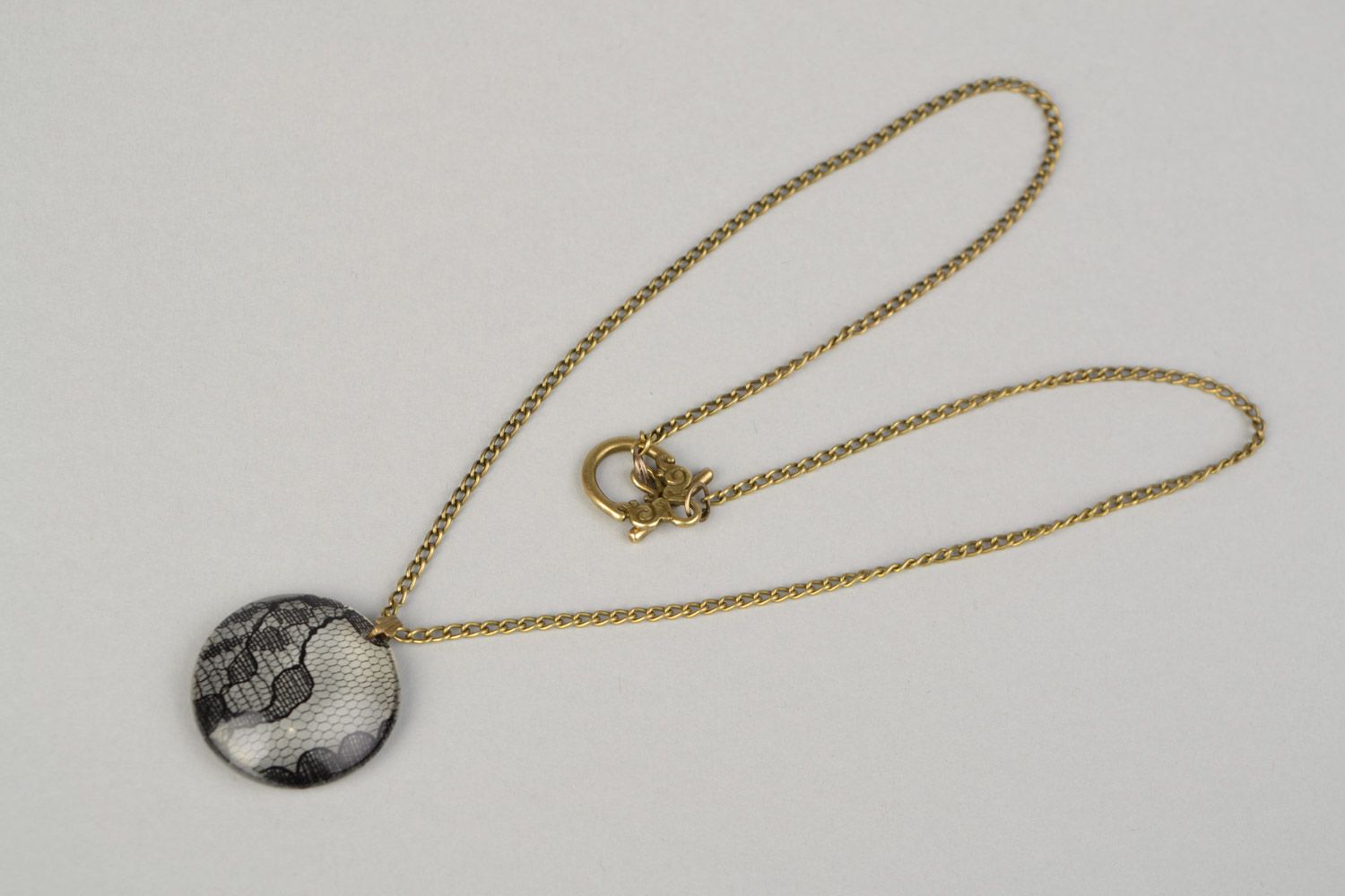 Beautiful women's round pendant on chain with epoxy coating photo 5