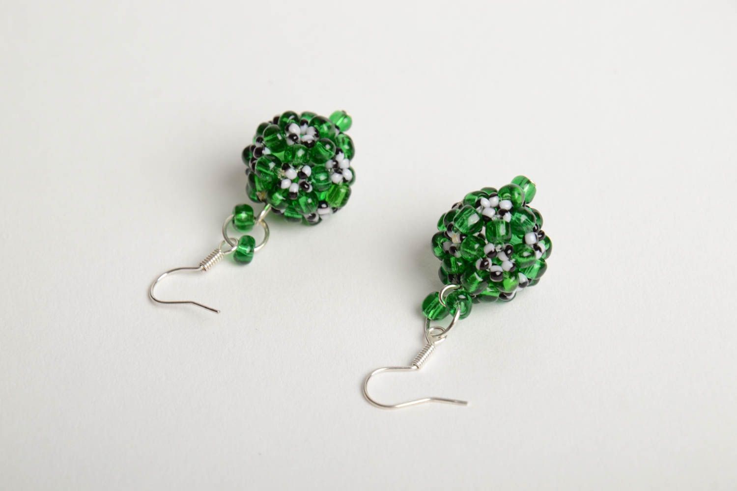 Handmade beautiful ball-shaped dangling earrings crocheted of green beads photo 2