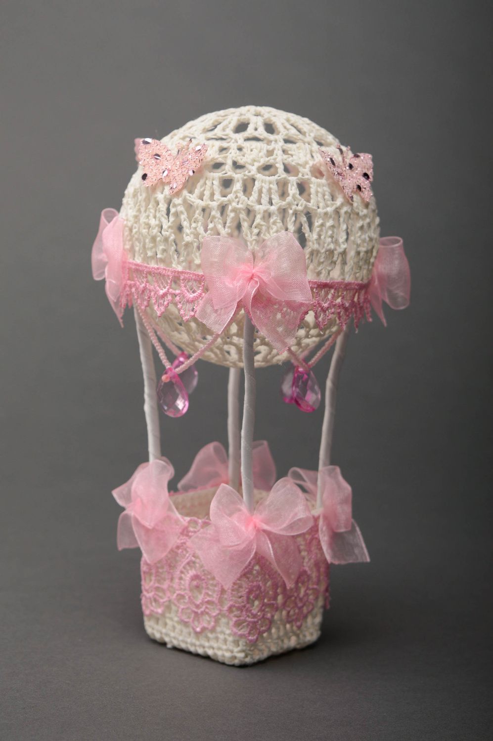 Decorative air balloon with threads and ribbons photo 1