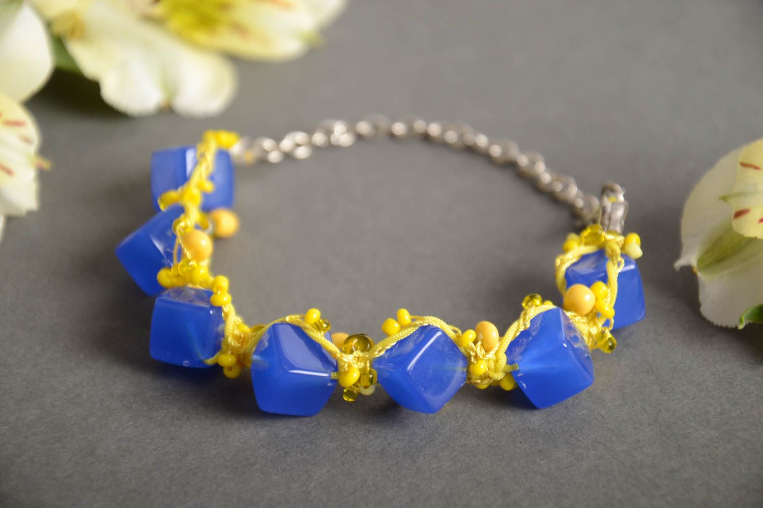Handmade wrist bracelet crocheted of beads in yellow and blue color combination photo 1