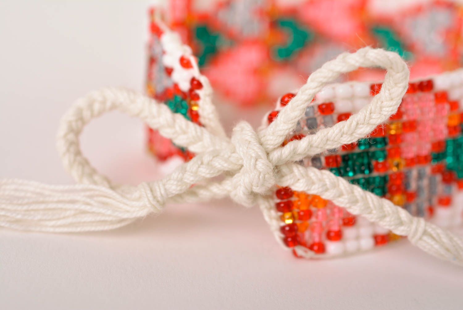 Wide handmade red and green beads bracelet in white on the white cord and ethnic style photo 4