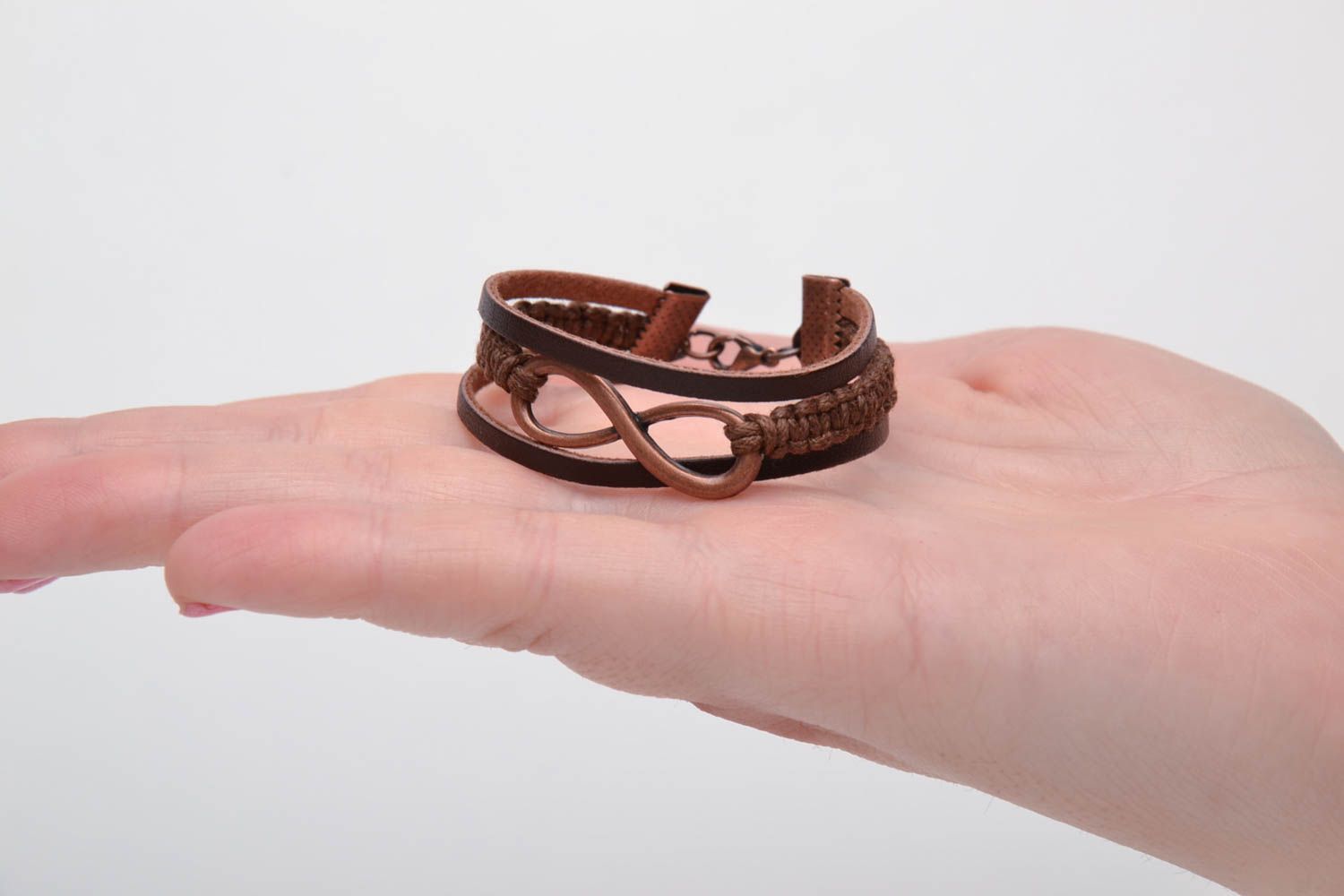 Handmade leather bracelet of brown color photo 5