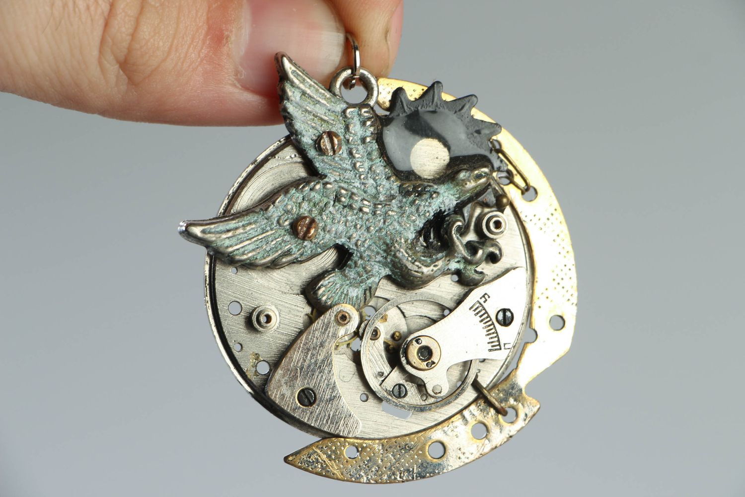Unusual designer pendant with mechanism photo 4