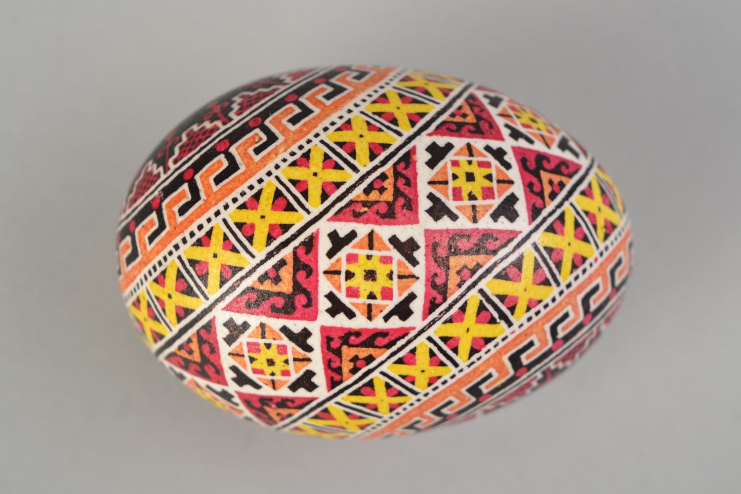 Handmade decorative Easter egg painted with wax Swastika photo 5