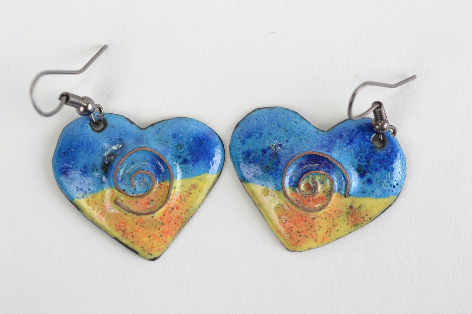 Handmade heart shaped small copper earrings with blue and yellow enamel coating photo 3