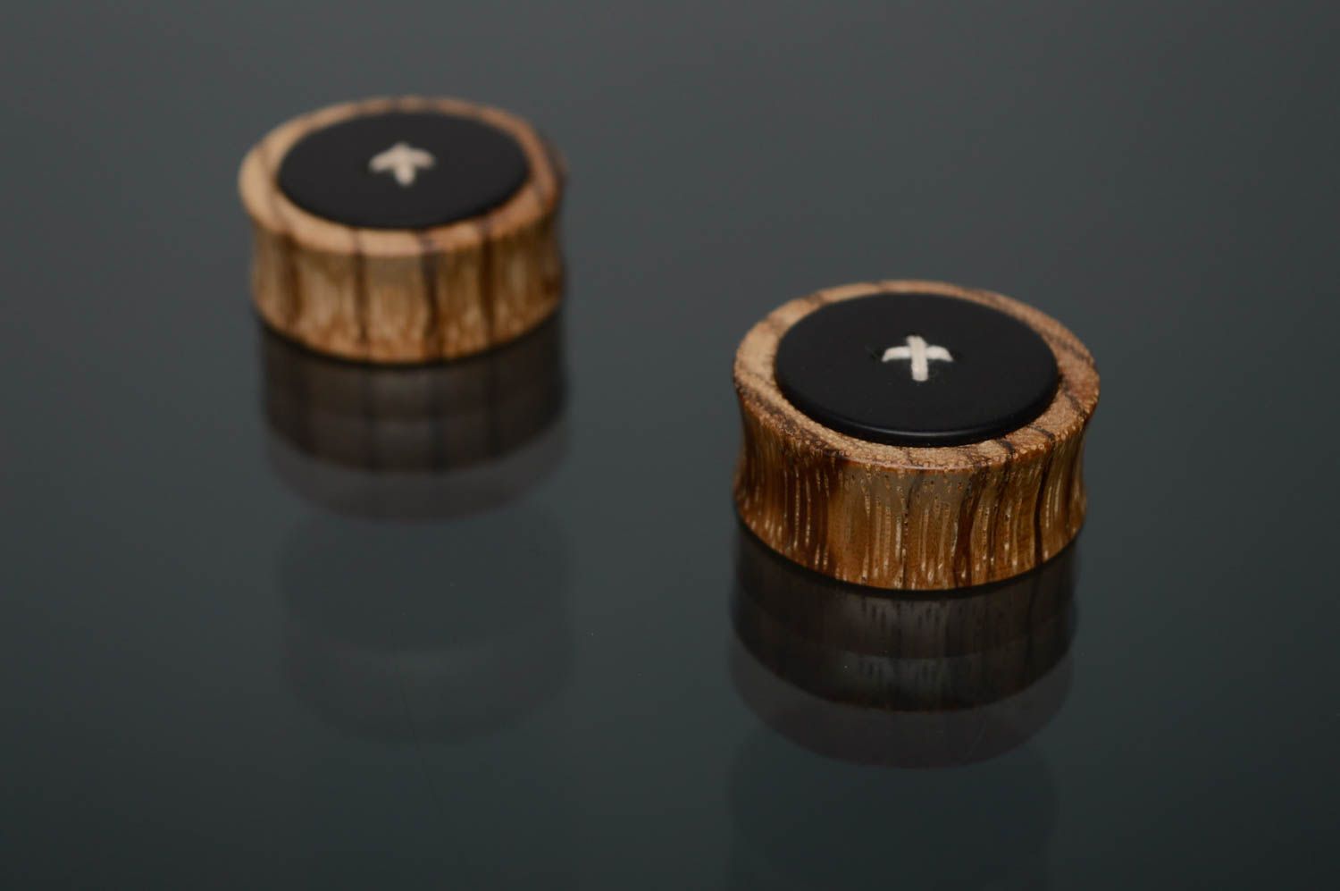 Unusual wooden ear plugs in the shape of buttons photo 5
