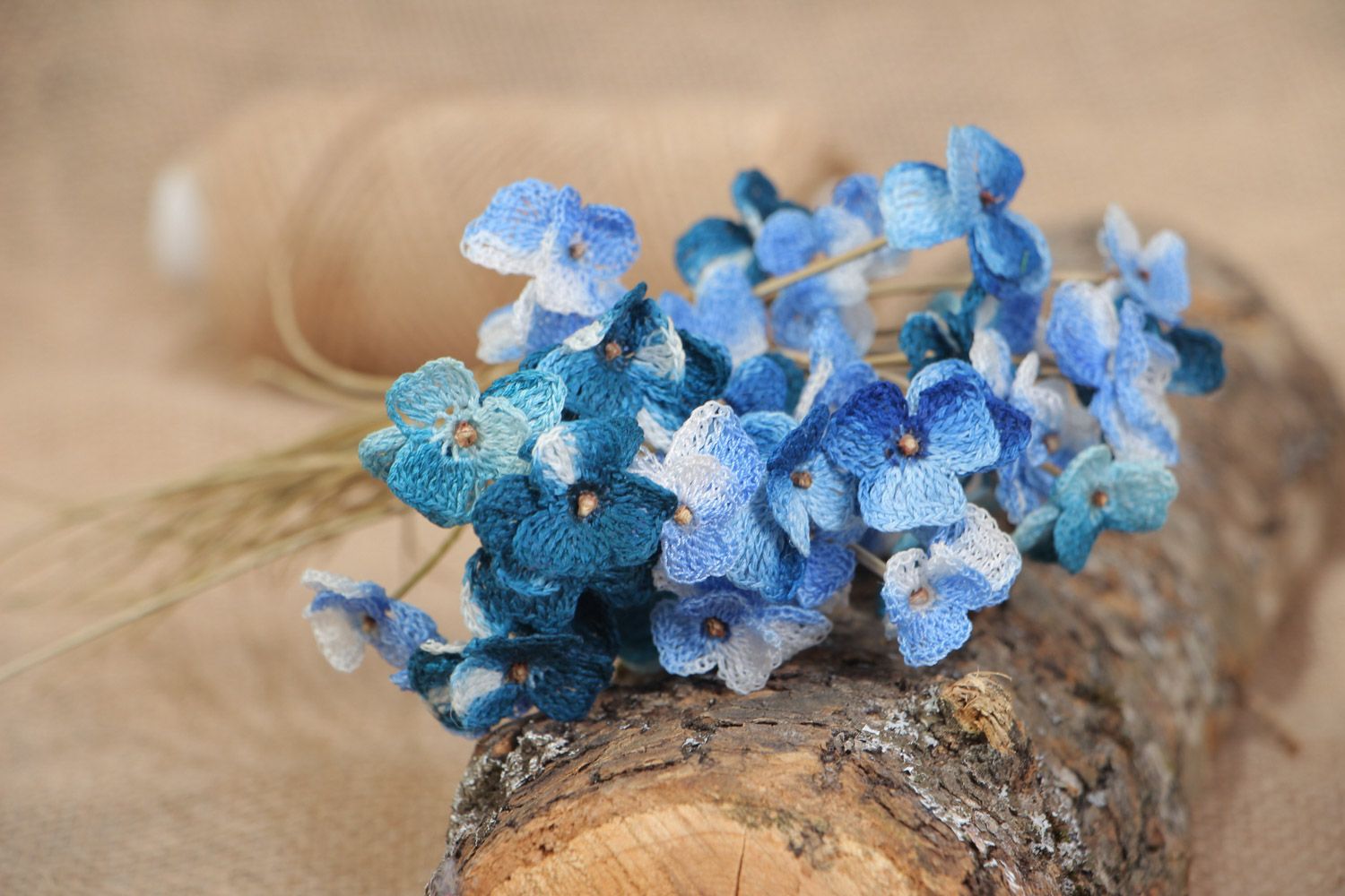 Bouquet of 43 blue decorative field flowers crocheted of cotton on acacia stalks photo 1