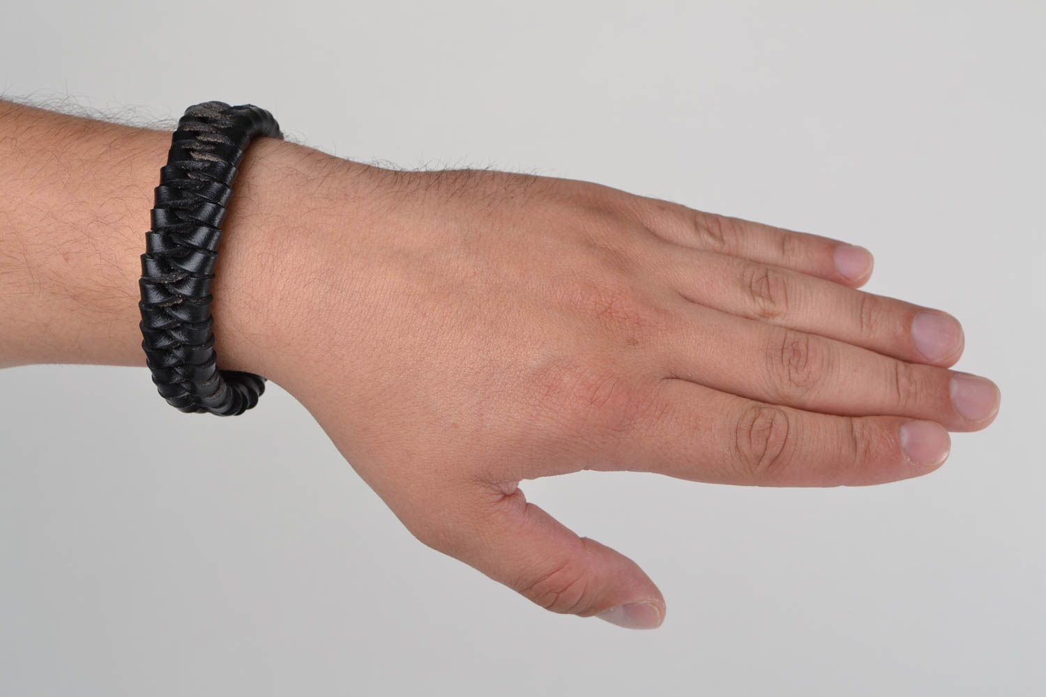 Beautiful handmade designer men's black woven leather bracelet with metal clasp photo 2