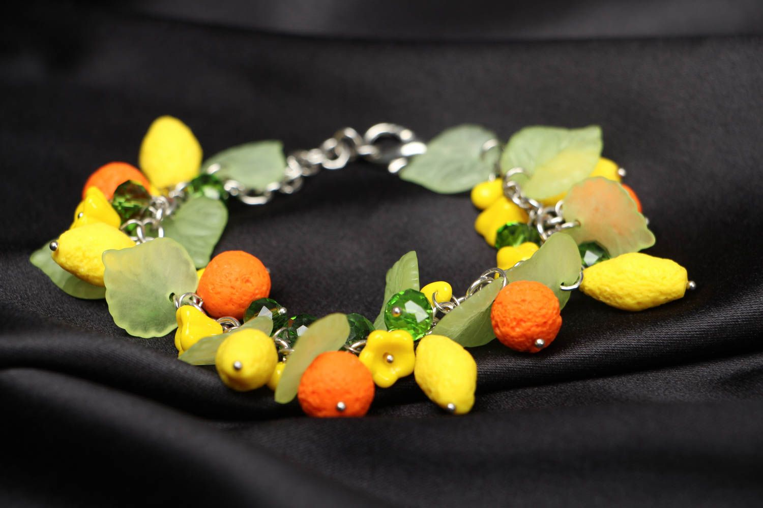 Plastic bracelet with charms photo 2