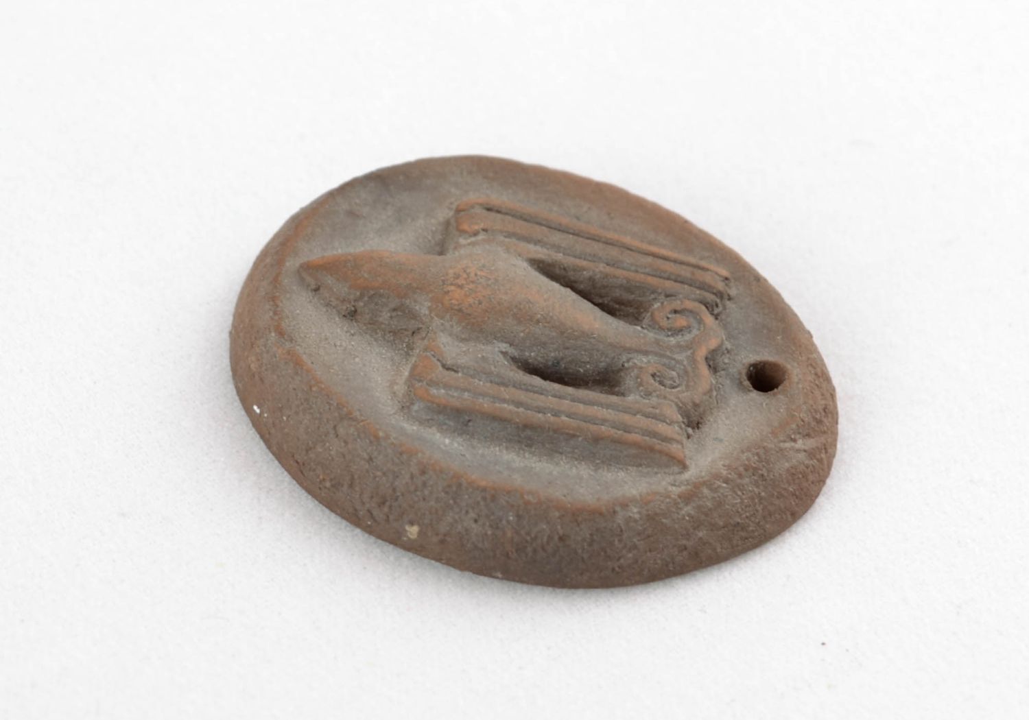 Round ceramic pendant with trident photo 5