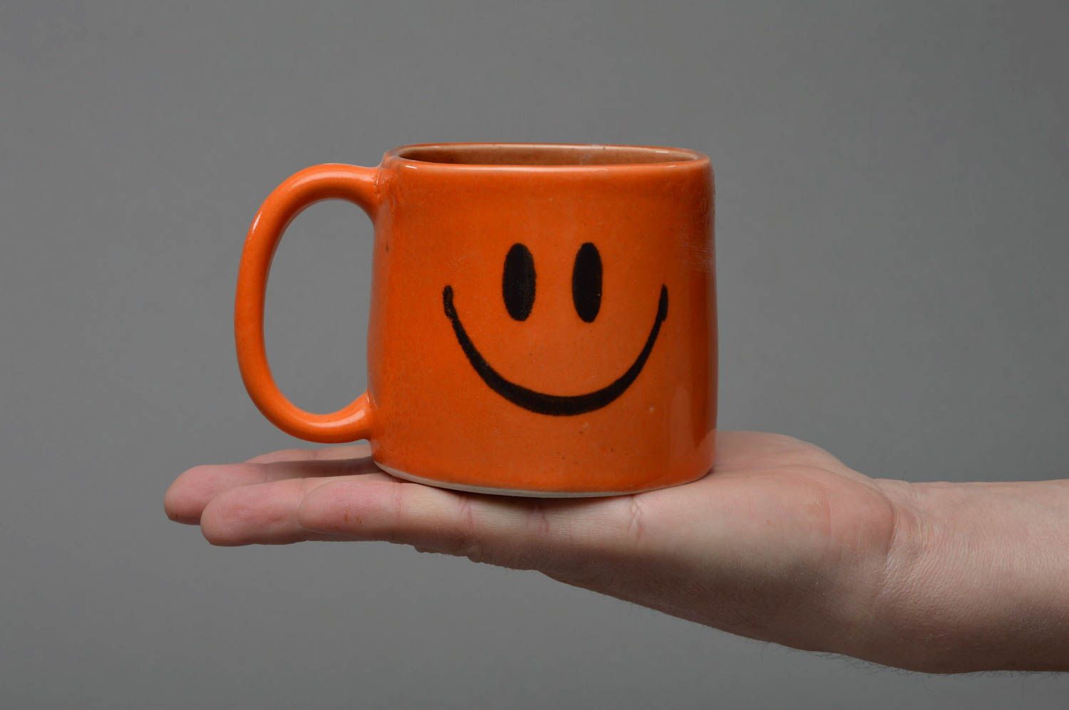Ceramic cup for coffee in orange color glazed inside with smile face photo 4