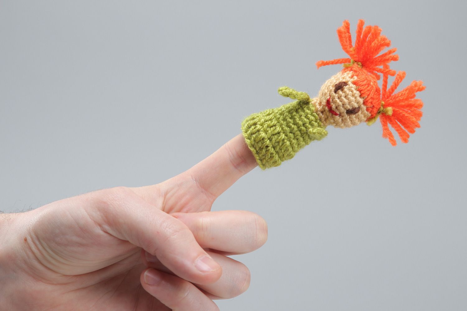 Handmade finger puppet crocheted of acrylic threads little girl for home theater photo 4