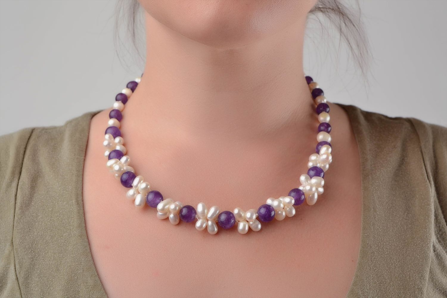 Handmade female beautiful white and lilac necklace made of natural beads photo 1