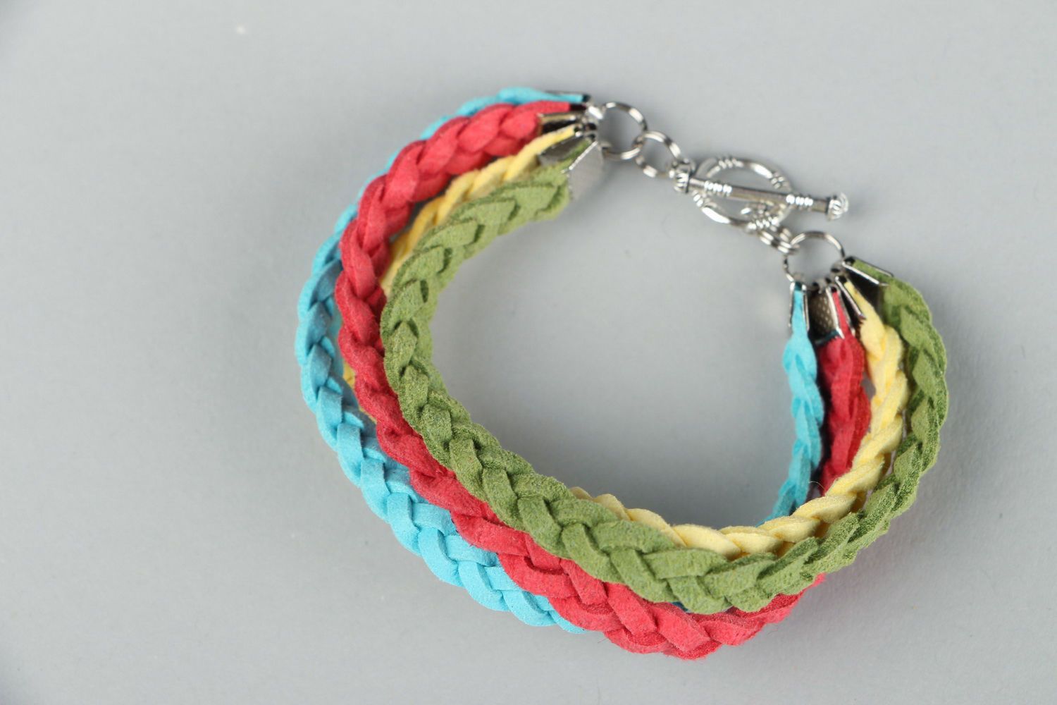 Bracelet tressé en daim multicolore fait main
 photo 2