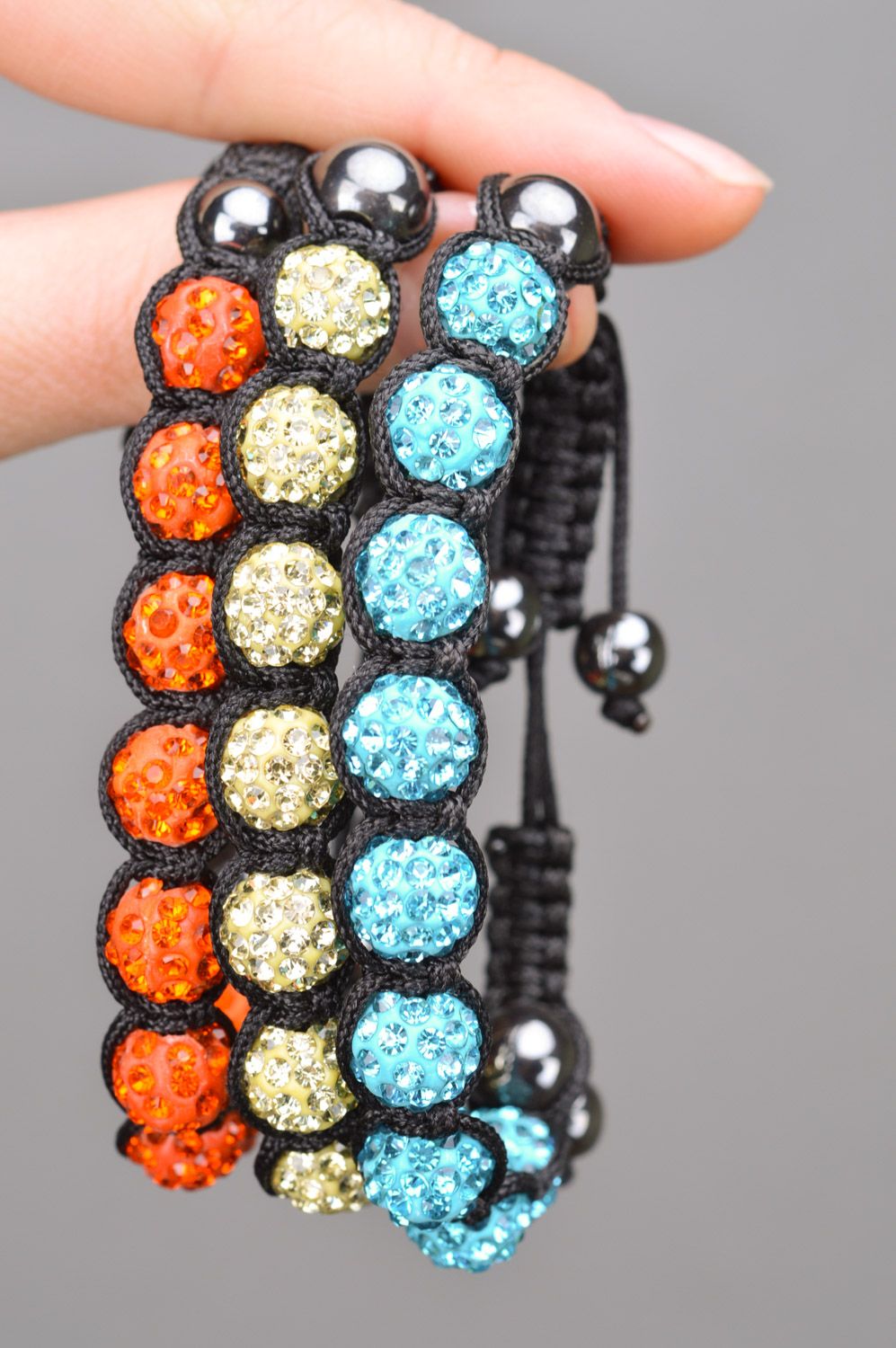 Set of beautiful designer handmade women's wrist bracelets woven of threads and beads 3 items photo 3
