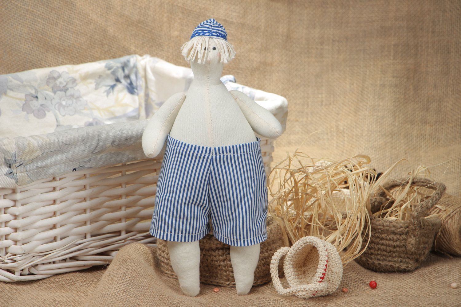 Funny handmade white and blue soft toy sewn of cotton and linen fabrics photo 1