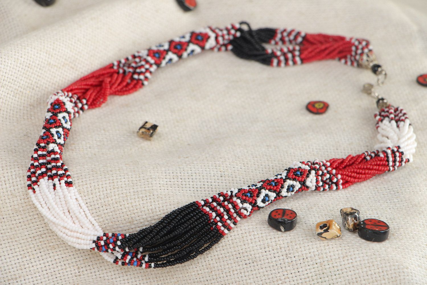 Massive handmade beaded necklace with beautiful patterns in ethnic style photo 1