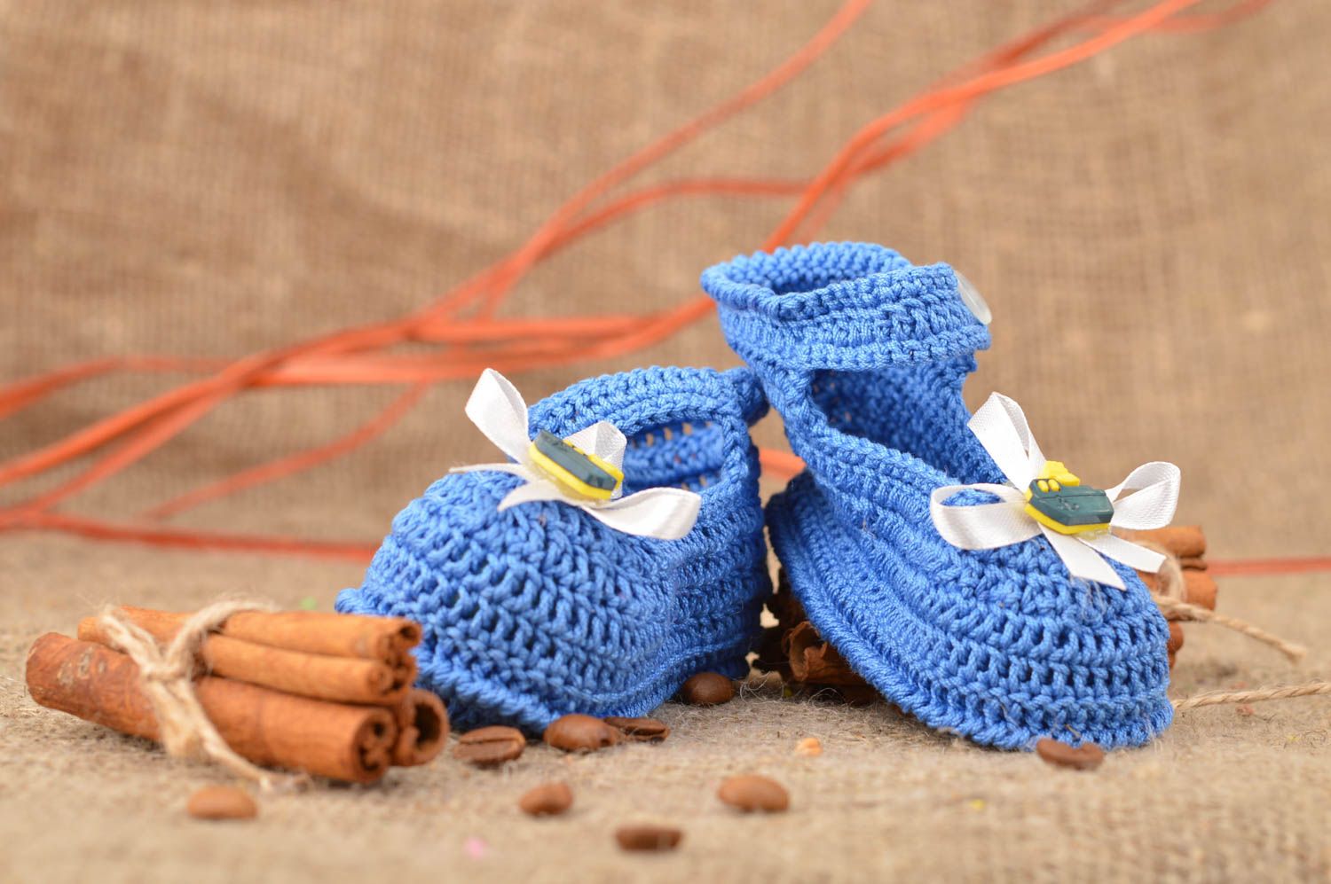 Handmade designer baby booties with blue ribbons and boats for baby boys photo 1