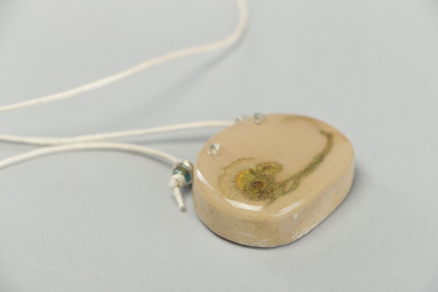 Tender handmade neck pendant with dried flowers coated with epoxy resin Herbary photo 2