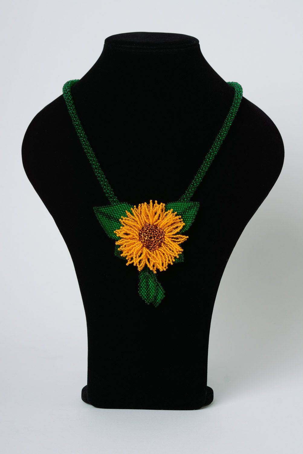 Handmade long beautiful necklace woven of beads in the shape of sunflower photo 2