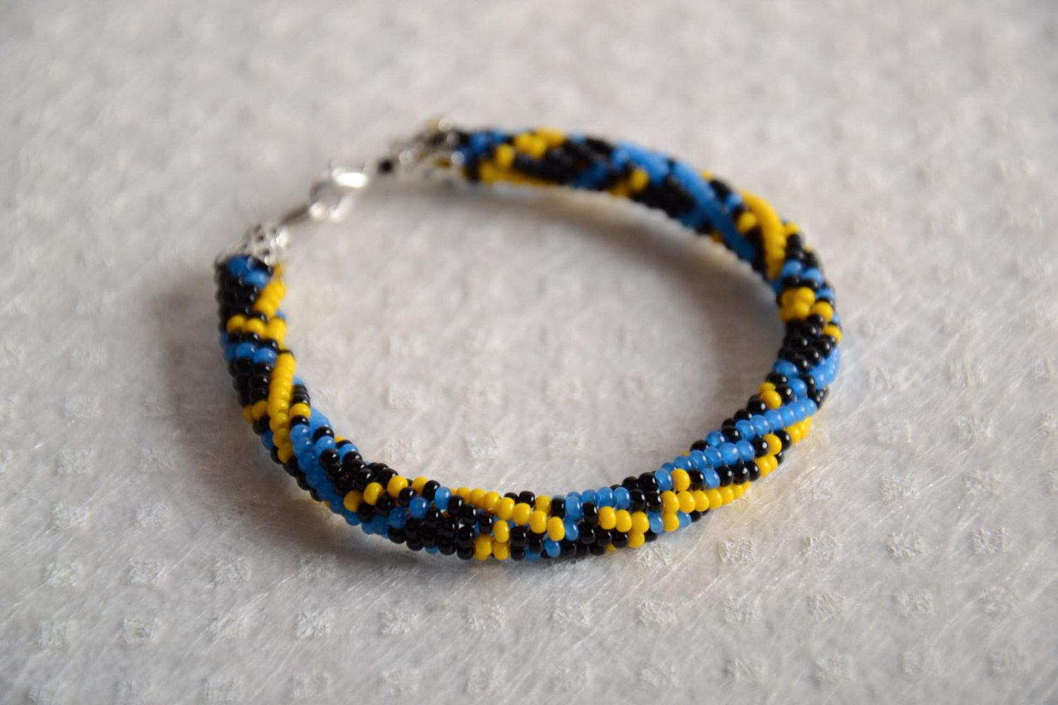 Beautiful bright handmade woven beaded cord bracelet for women photo 1