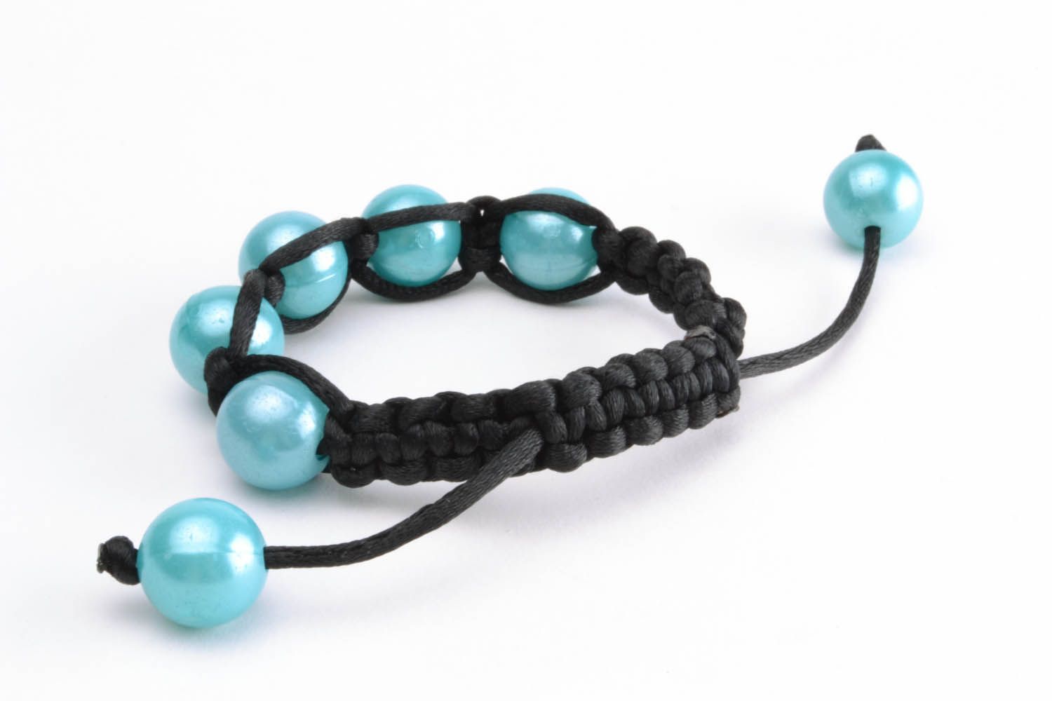 Braided bracelet with blue beads photo 3