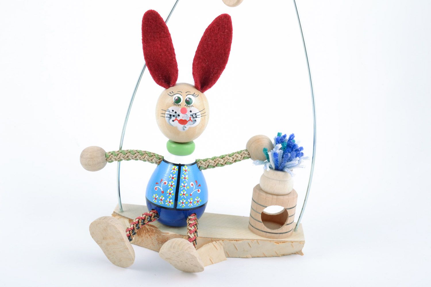 Handmade decorative painted eco friendly wooden toy of rabbit on swing  photo 3