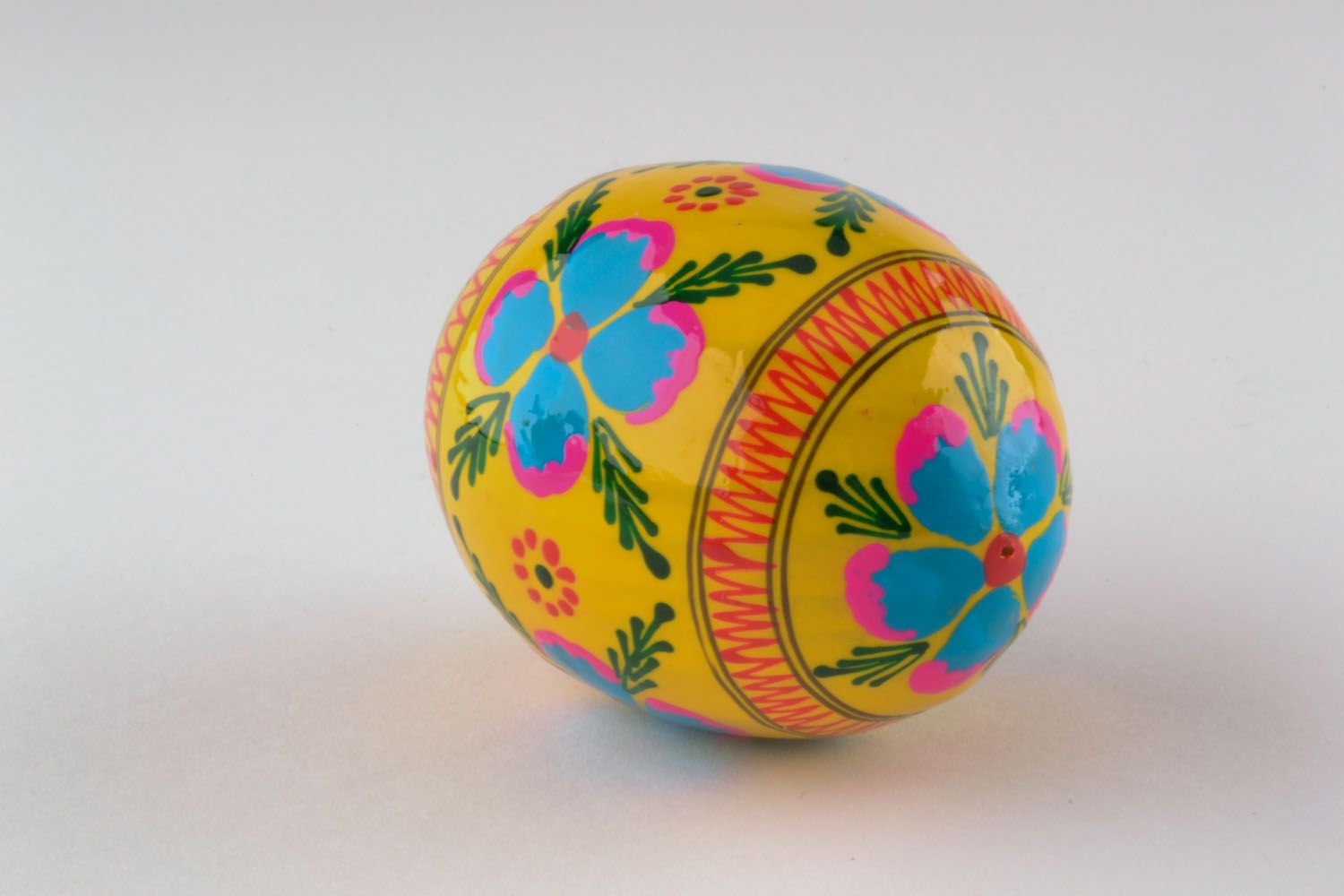 Painted wooden egg for decoration photo 4